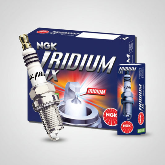 NGK Iridium LX spark plug shown in front of its blue retail packaging box, with a smaller box inset and a disclaimer text at the bottom.